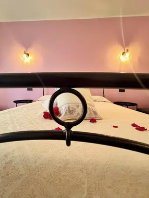 Letto o letti in una camera di Ichnos experience room