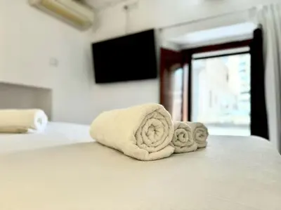 Letto o letti in una camera di Centre View, Cagliari, Sardegna