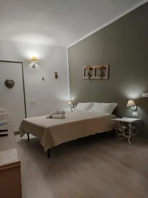 Letto o letti in una camera di Summer loft