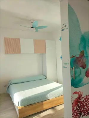 Letto o letti in una camera di Risveglio sul mare