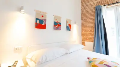 Letto o letti in una camera di Ceramic Rooms