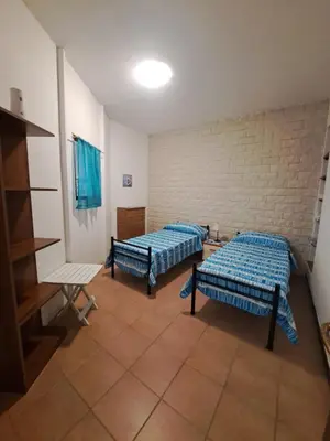 Letto o letti in una camera di Holiday House