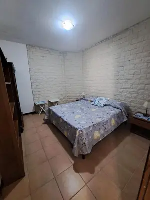 Letto o letti in una camera di Holiday House