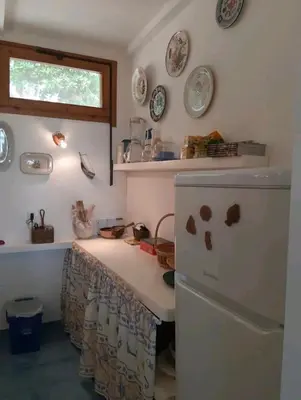 Cucina o angolo cottura di Casa Erika 39 in Is Molas Golf Resort