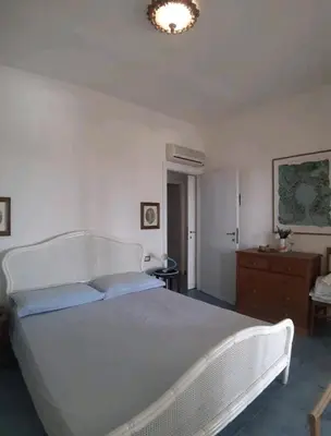 Letto o letti in una camera di Casa Erika 39 in Is Molas Golf Resort