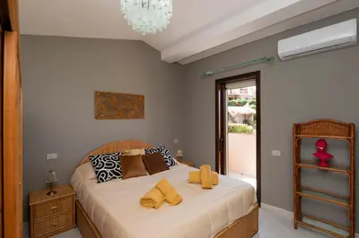 Letto o letti in una camera di President Villa Tuerredda