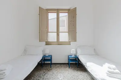 Letto o letti in una camera di Beachside Apartments - Cozy