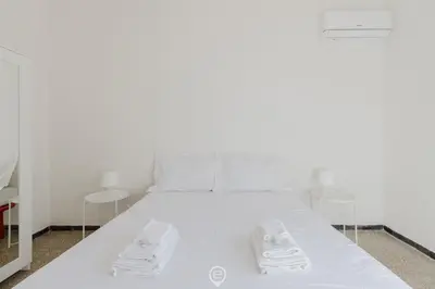 Letto o letti in una camera di Beachside Apartments - Cozy