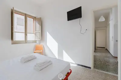 Letto o letti in una camera di Beachside Apartments - Cozy