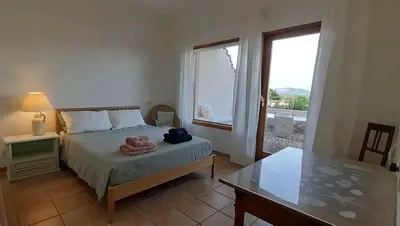 Letto o letti in una camera di Casa Erika 38 in Is Molas Golf Resort