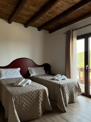 Letto o letti in una camera di Is Cubas