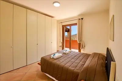 Letto o letti in una camera di Casa Pisano