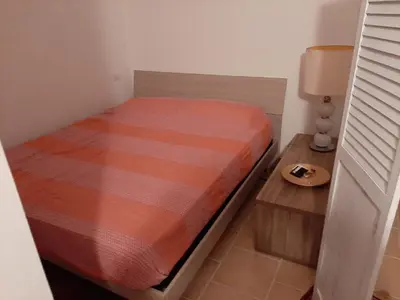 Letto o letti in una camera di Appartamento vicino Costa rey