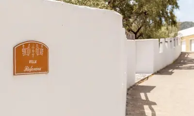 Certificato, attestato, insegna o altro documento esposto da Villa Stefanina - Vista mare e piscina privata vicina alla spiaggia di Cala Sinzias