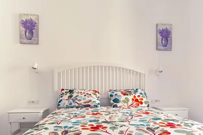 Letto o letti in una camera di In centro appartamento di charme con terrazza!