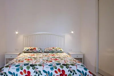 Letto o letti in una camera di In centro appartamento di charme con terrazza!