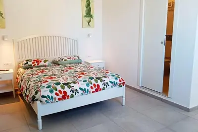 Letto o letti in una camera di In centro storico panoramico con ampia terrazza!
