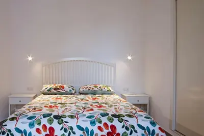 Letto o letti in una camera di In centro storico Confort e charme !