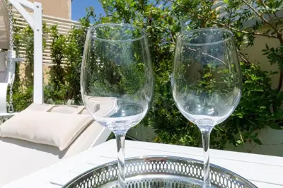 Bevande di Terrazza con Jacuzzi su Attico Elegante a Cagliari