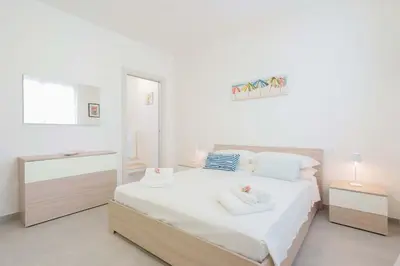 Letto o letti in una camera di Guest House MareLuna