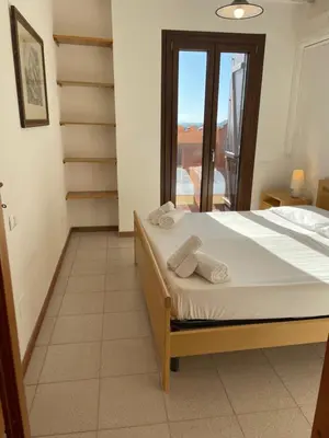 Letto o letti in una camera di Appartamento sul mare super panoramico