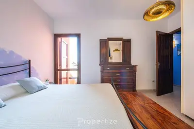 Letto o letti in una camera di Il terrazzo sulla duna 3 by Propertize - Torre dei Corsari