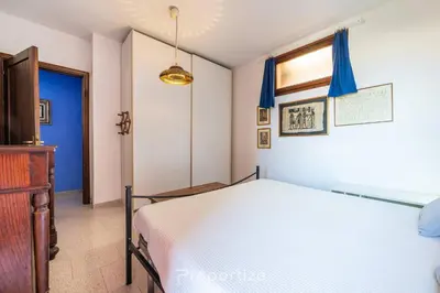 Letto o letti in una camera di Il terrazzo sulla duna 3 by Propertize - Torre dei Corsari