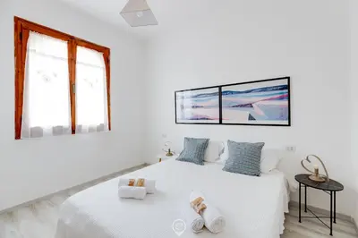 Letto o letti in una camera di Villa del Mare - Appartamento Acqua