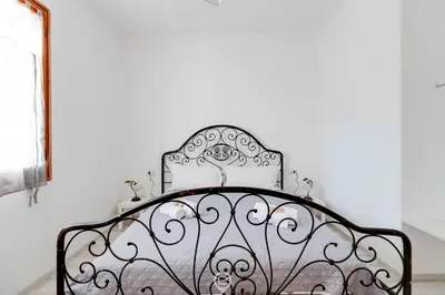 Letto o letti in una camera di Villa del Mare - Appartamento Acqua