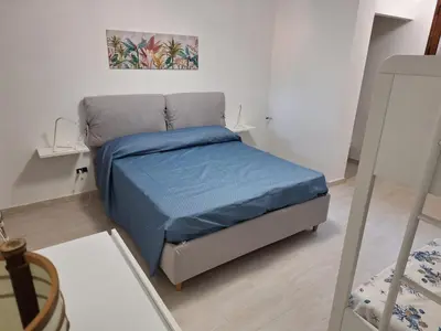 Letto o letti in una camera di Casa NOAH