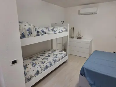 Letto o letti in una camera di Casa NOAH