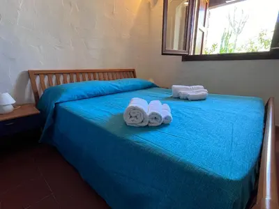 Letto o letti in una camera di Villetta Marino P By La Via Del Mare Viaggi e Vacanze