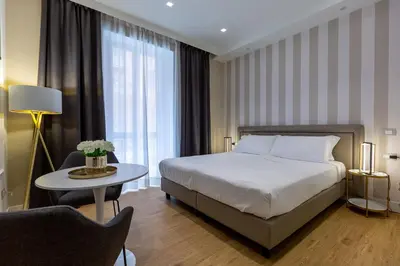 Letto o letti in una camera di Casa Lounge Costituzione