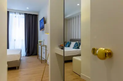 Letto o letti in una camera di Casa Lounge Costituzione