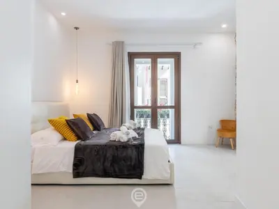 Letto o letti in una camera di Dimora della Gherardesca