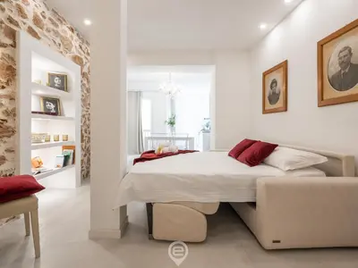 Letto o letti in una camera di Dimora della Gherardesca