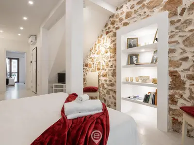 Letto o letti in una camera di Dimora della Gherardesca