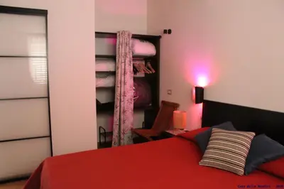 Letto o letti in una camera di Casa delle rondini