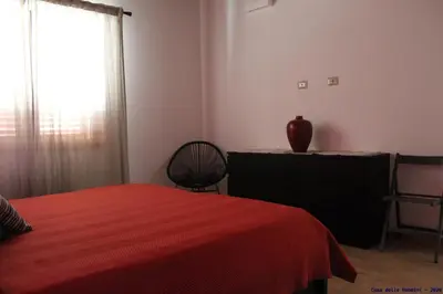 Letto o letti in una camera di Casa delle rondini