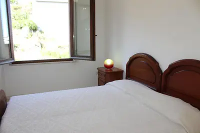 Letto o letti in una camera di Casa Rosi