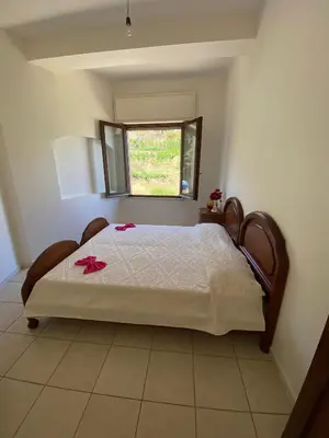 Letto o letti in una camera di Casa Rosi