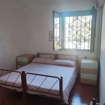 Letto o letti in una camera di Villa M