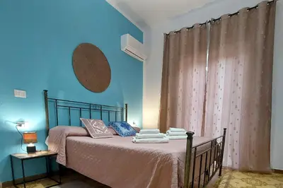 Letto o letti in una camera di La Pintadera Sarda