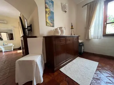 Letto o letti in una camera di Villa Sardinia Villasimius