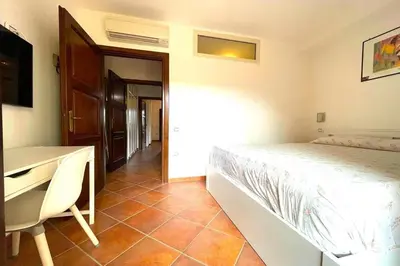 Letto o letti in una camera di Villa Labea