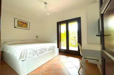 Letto o letti in una camera di Villa Labea