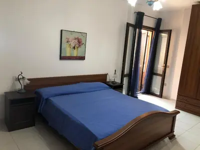 Letto o letti in una camera di Casa delle ginestre