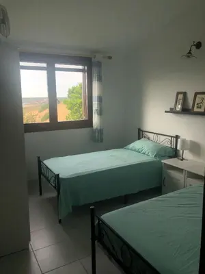 Letto o letti in una camera di Casa delle ginestre