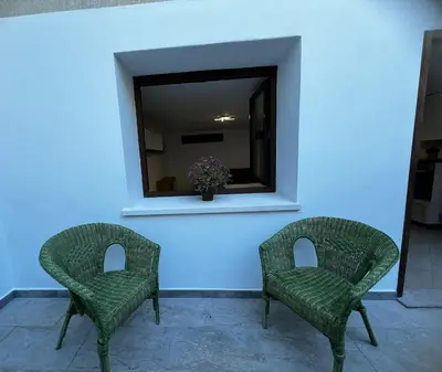 Area soggiorno di Appartamento fronte Arbatax park resort