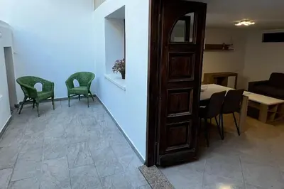 Area soggiorno di Appartamento fronte Arbatax park resort